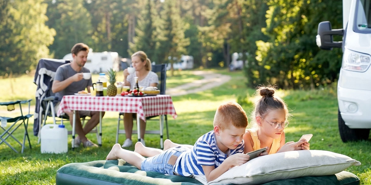Multiple RVs sharing an overloaded campground Wi-Fi network with slow speeds.